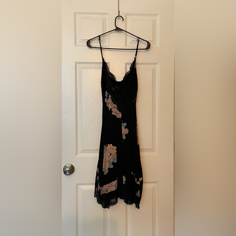 Sexy Free People Black Lace and floral accents. Size medium